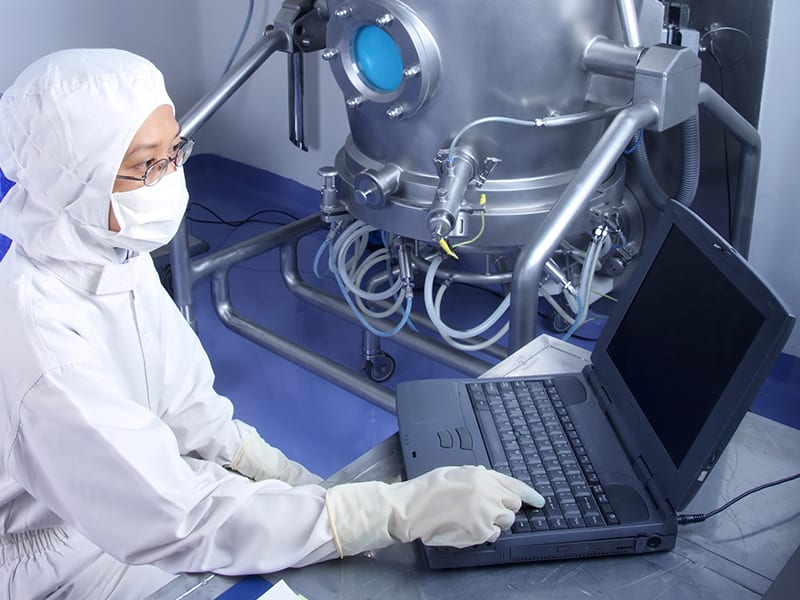 pharmaceutical worker with laptop